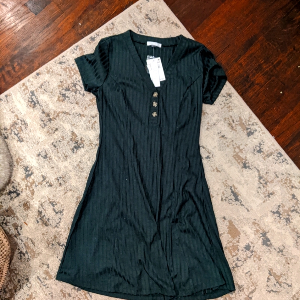 A green, ribbed dress
